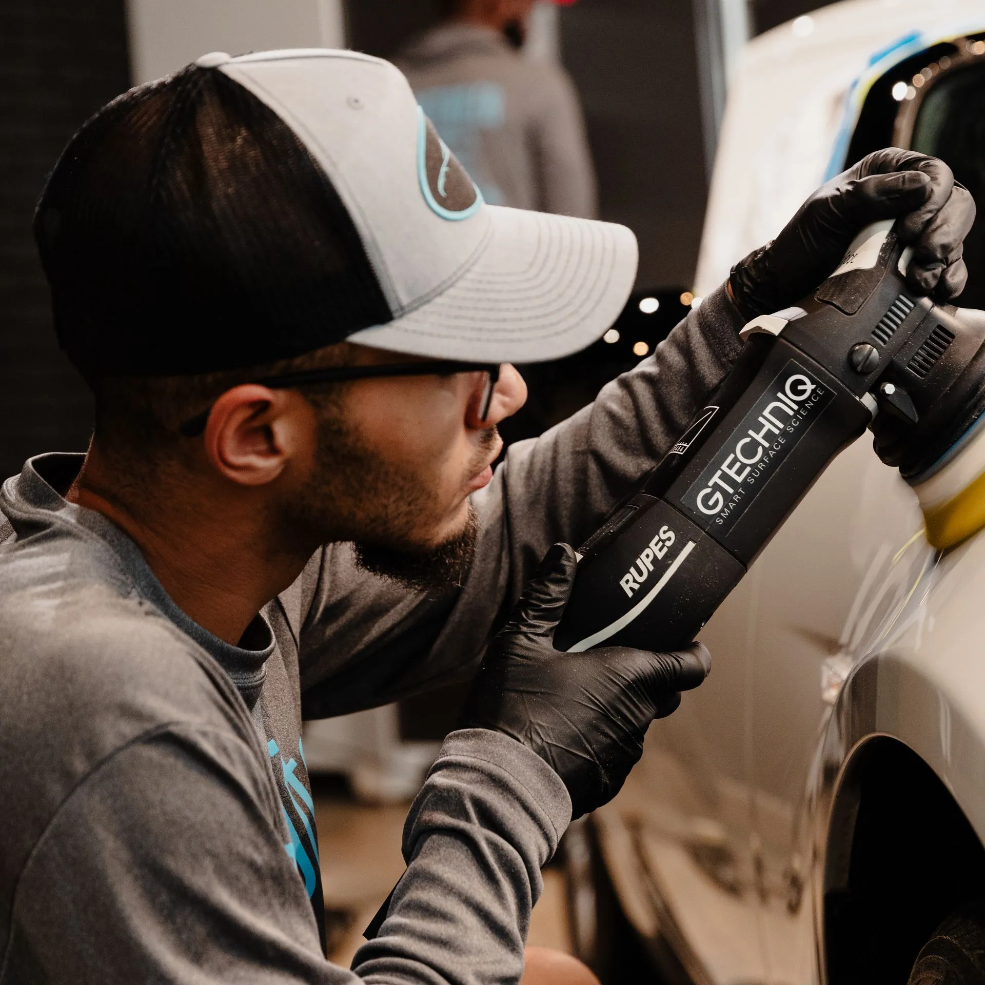 Applying coating by hand in the Gtechniq bay