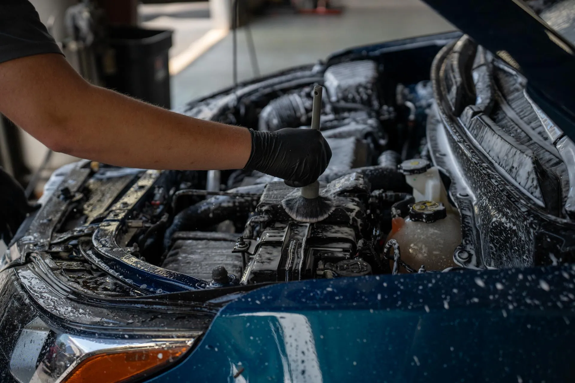 Steam cleaning an engine bay